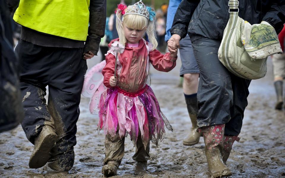 Glastonbury Festival 2011...Four-year-old Lyra Warrilow from Rugby enjoys her third Glastonbury Festival dressed as a princess  - Credit: Ben Birchall/PA