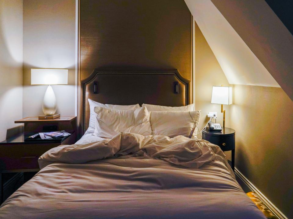 A queen bed in the Fairmont hotel in Quebec