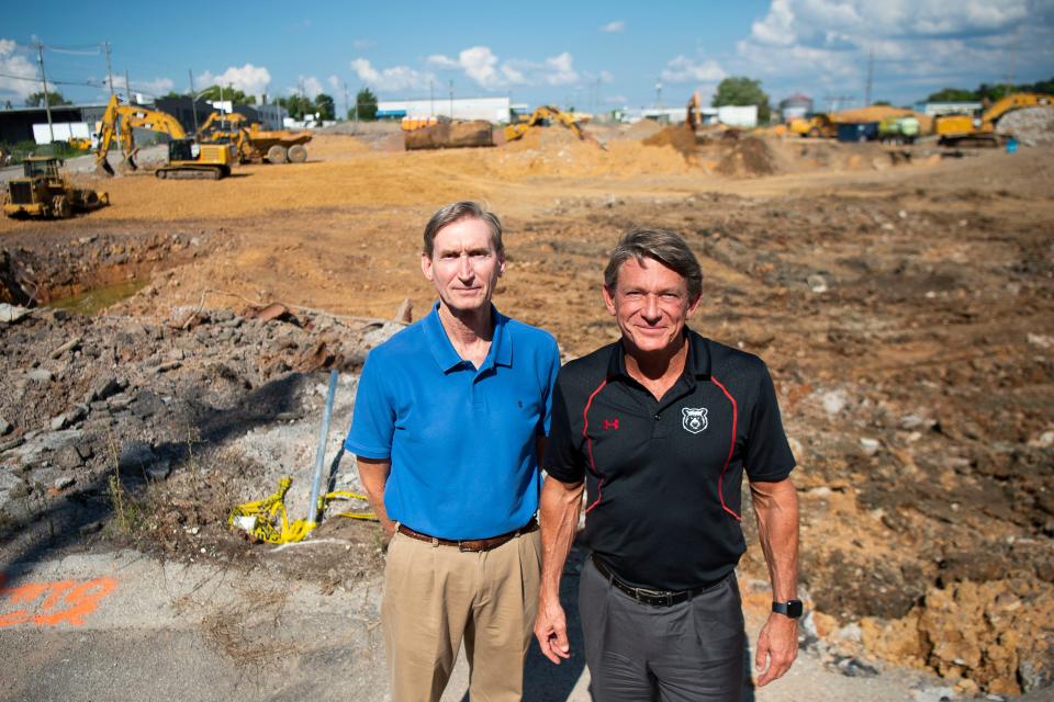 Tennessee Smokies CEO Doug Kirchhofer, left, poses with team owner Randy Boyd at the site of the forthcoming minor league baseball stadium being built just east of the Old City near downtown Knoxville. With the stadium now priced at $114 million, the development team and its partners are continuing their work to have disadvantaged business enterprises represent 17% of the total contract value.