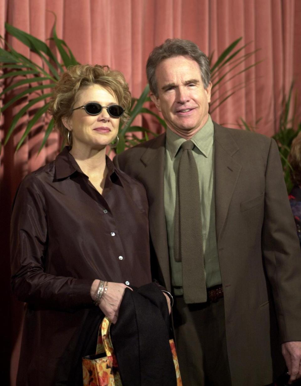 Annette Bening, left, and husband Warren Beatty arrive to the Academy of Motion Picture Arts and Sciences nominees luncheon in Beverly Hills, Ca., on March 13, 2000.