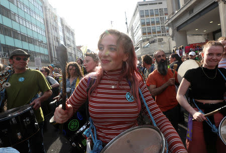 Climate change activists attend the Extinction Rebellion protest at Oxford Circus in London, Britain April 18, 2019. REUTERS/Simon Dawson