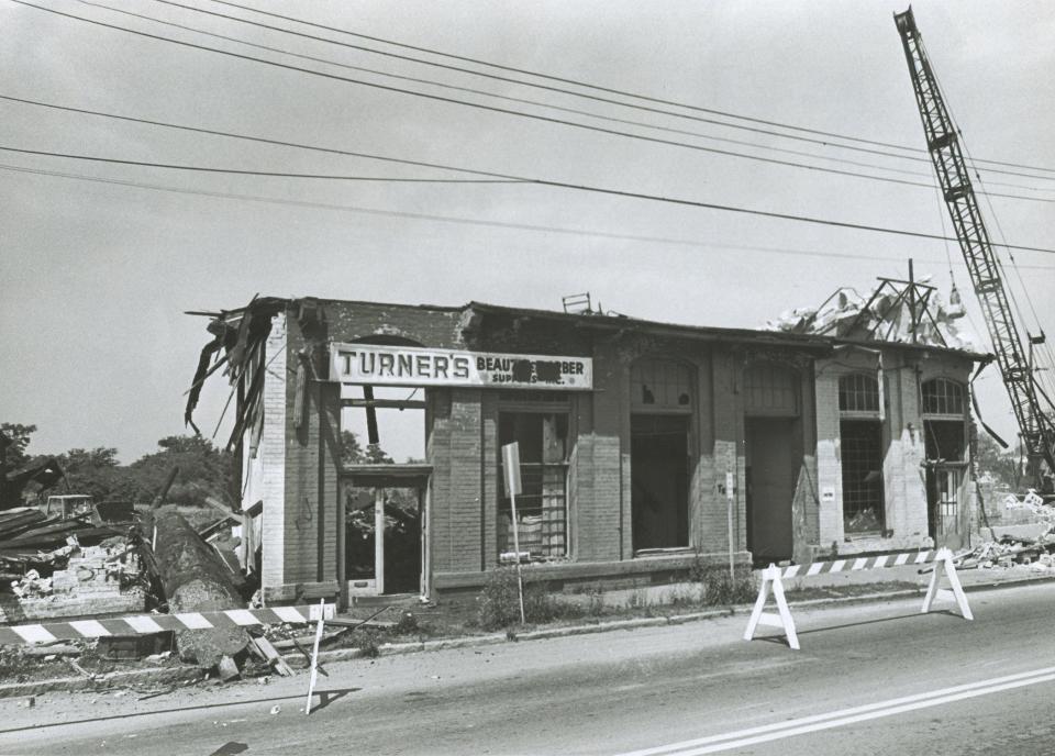 File Photo from July 8, 1979 shows businesses being torn down, in the Hayti business district to make room for the East-West Expressway.