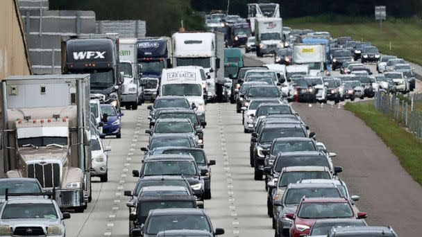 PHOTO: Heavy traffic moves slowly on I-4 East as residents evacuate the Gulf Coast of Florida in advance of the arrival of Hurricane Ian, Sept. 27, 2022, in Four Corners, Fla.  (Win Mcnamee/Getty Images)