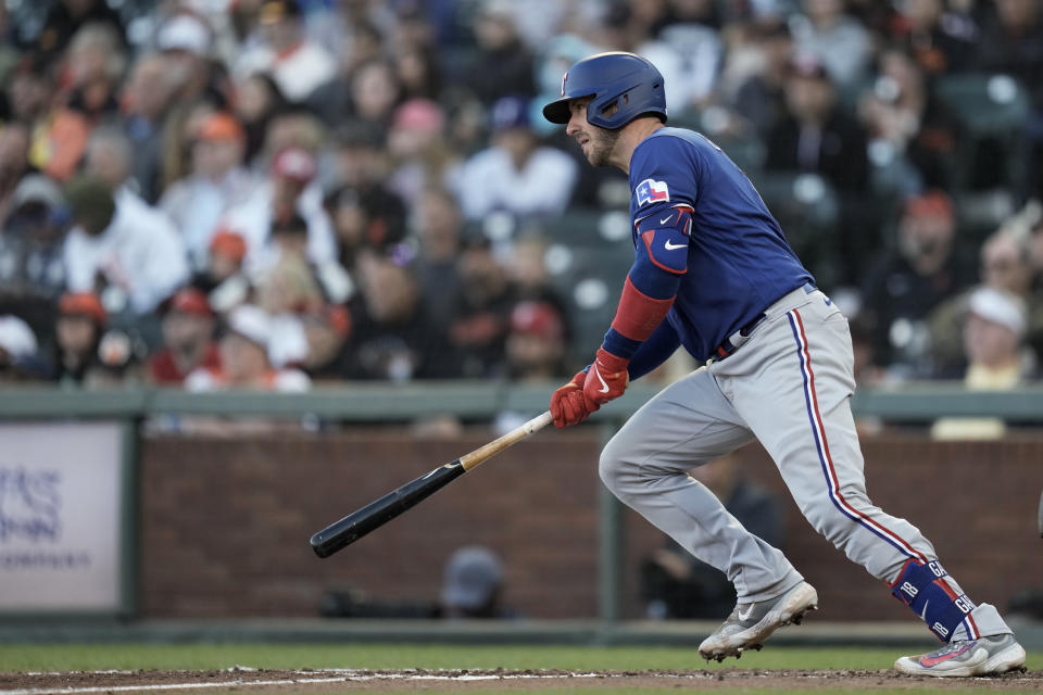 Texas Rangers' Mitch Garver watches his RBI single against the San Francisco Giants during the fourth inning of a baseball game Saturday, Aug. 12, 2023, in San Francisco. (AP Photo/Godofredo A. Vásquez)