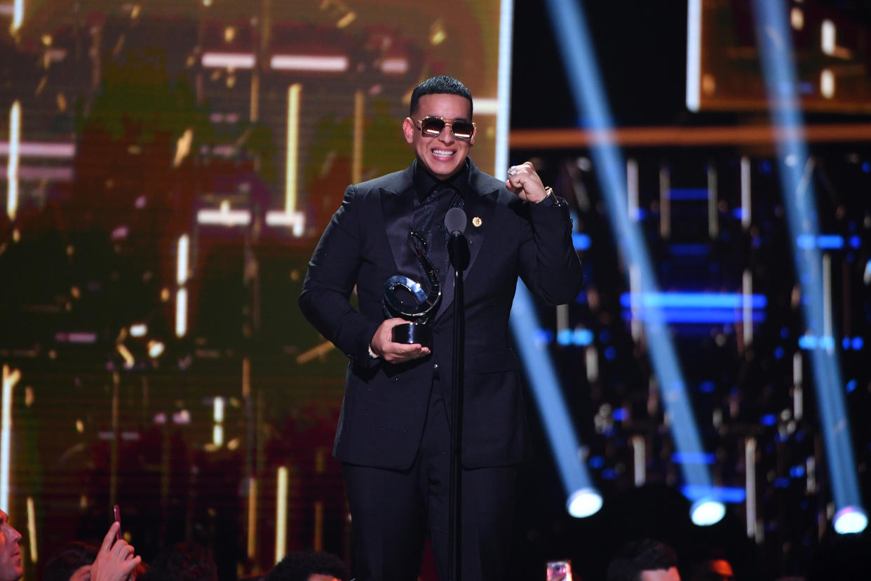 MIAMI, FLORIDA - FEBRUARY 20: Daddy Yankee accepts an award on stage during Univision's Premio Lo Nuestro 2020 at AmericanAirlines Arena on February 20, 2020 in Miami, Florida. (Photo by Jason Koerner/Getty Images)