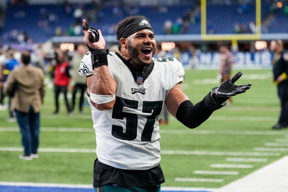 Philadelphia Eagles linebacker T.J. Edwards (57) celebrates as he leaves the field following an NFL football game against the Indianapolis Colts in Indianapolis, Fla., Sunday, Nov. 20, 2022. The Eagles deleted the Colts 17-16. (AP Photo/AJ Mast)