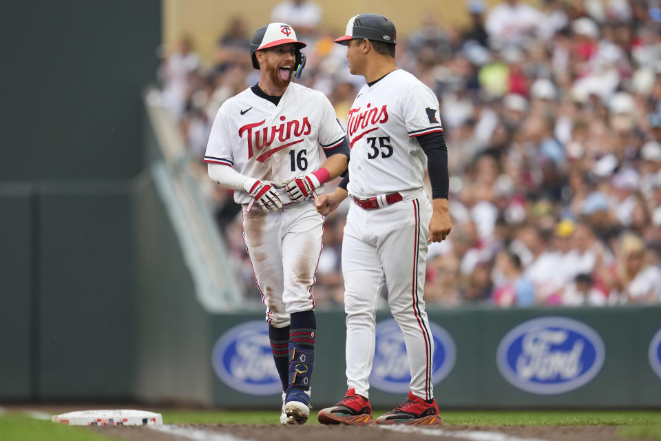 Minnesota Twins' Jordan Luplow (16) celebrates after reaching on an infield single during the sixth inning of a baseball game against the New York Mets, Saturday, Sept. 9, 2023, in Minneapolis. (AP Photo/Abbie Parr)