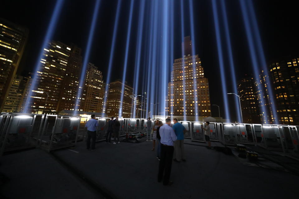 <p>The Tribute in Light rises above the New York City skyline from a rooftop on Sept. 5, 2018. (Photo: Gordon Donovan/Yahoo News) </p>