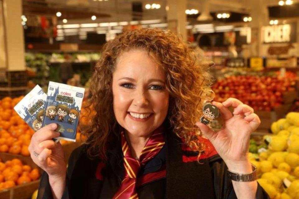 Coles representative Lisa Ronson holds Magical Builders collectables