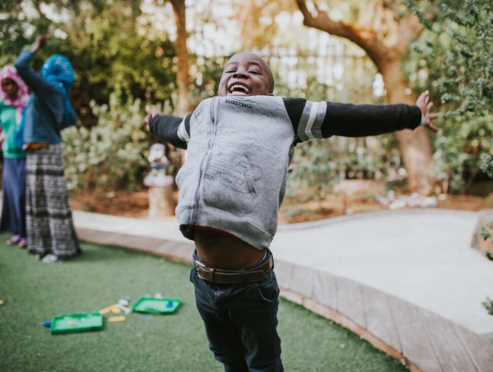 young boy happy and smiling