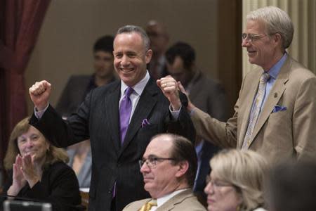 California Senate president pro tempore Darrell Steinberg (D-Sacramento) celebrates as his bill SB743 passes, which modifies the California Environmental Quality Act, at the State Capitol in Sacramento, California, September 12, 2013. REUTERS/Max Whittaker