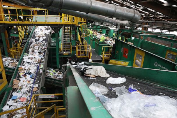 PHOTO: In this June 11, 2019, file photo, a conveyer belt moving flimsy and film plastic (bottom right), destined for landfill, carries pieces of plastic sorted from the initial sort deck through Recologys Recycle Central in San Francisco, Calif. (San Francisco Chronicle via Getty Images, FILE)
