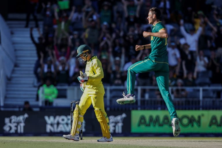 South Africa's Marco Jansen (R) celebrates after delivering a ball dismissing Australia's Alex Carey (L) in the fifth one-day international at Wanderers stadium in Johannesburg (PHILL MAGAKOE)