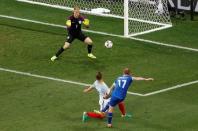 Football Soccer - England v Iceland - EURO 2016 - Round of 16 - Stade de Nice, Nice, France - 27/6/16 Iceland's Aron Gunnarsson shoots at goal REUTERS/Yves Herman Livepic