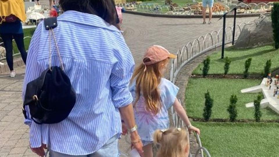 Helen George walking with her children at Legoland Windsor