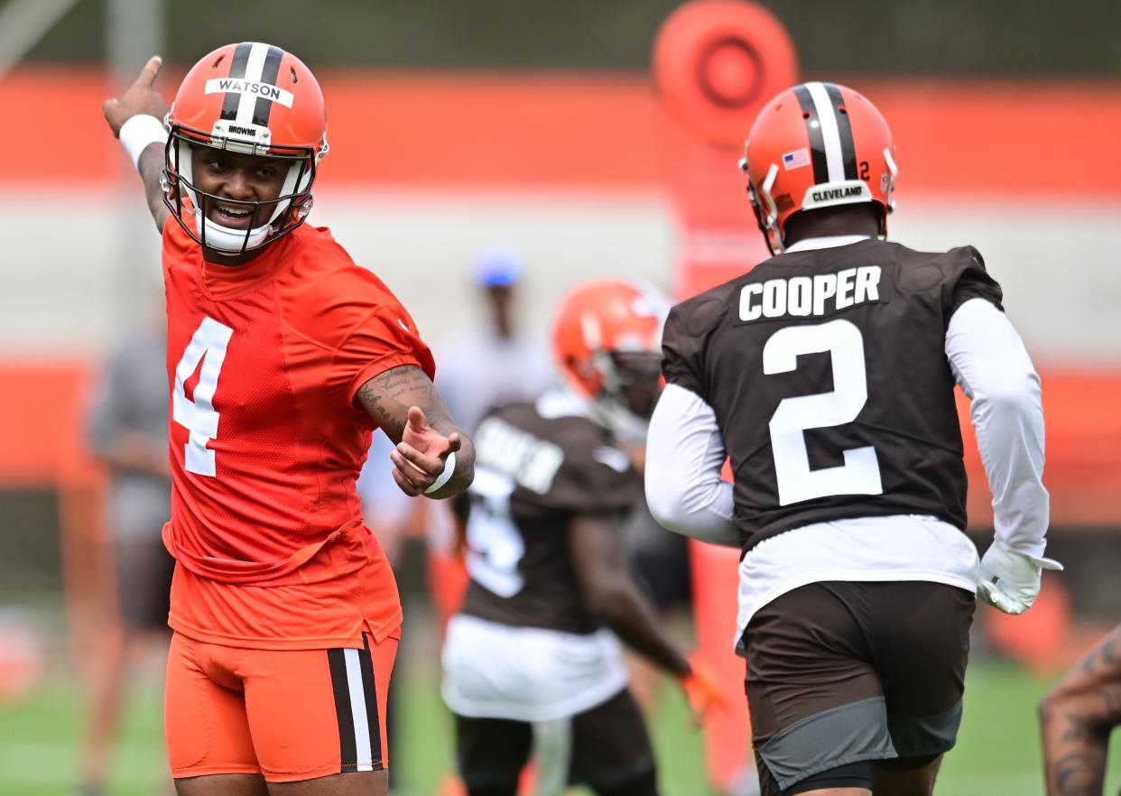 Browns quarterback Deshaun Watson (4) runs the offense with wide receiver Amari Cooper (2) during organized team activities in Berea, May 25, 2022.