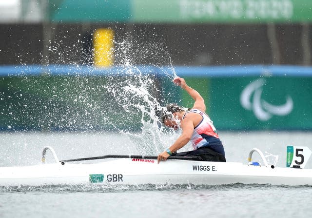 Great Britain’s Emma Wiggs punches the water following Paralympic gold in the va’a discipline of paracanoe