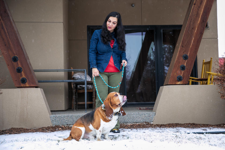 Nina Kouprianova takes her basset hound, Rody, out in Whitefish, Montana. (Photo: Ilana Panich-Linsman for HuffPost)