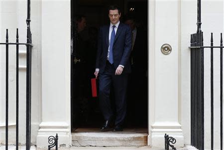 Britain's Chancellor of the Exchequer, George Osborne, carries his budget case as leaves number 11 Downing Street, before delivering his budget to the House of Commons, in central London March 19, 2014. REUTERS/Suzanne Plunkett