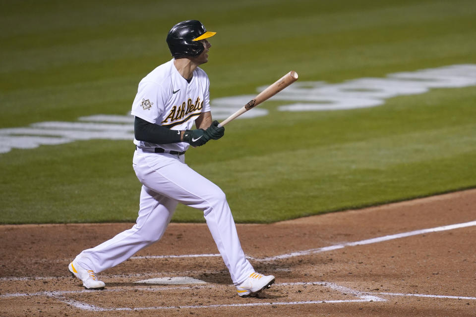 Oakland Athletics' Matt Olson watches his solo home run against the Detroit Tigers during the fifth inning of a baseball game in Oakland, Calif., Thursday, April 15, 2021. (AP Photo/Jeff Chiu)