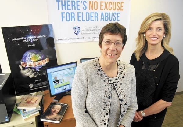 Laura Mosqueda, M.D., left, and Kerry Burnight, Ph.D., both professors with the Division of Geriatric Medicine and Gerontology pose for a portrait at their office in Orange on Tuesday.