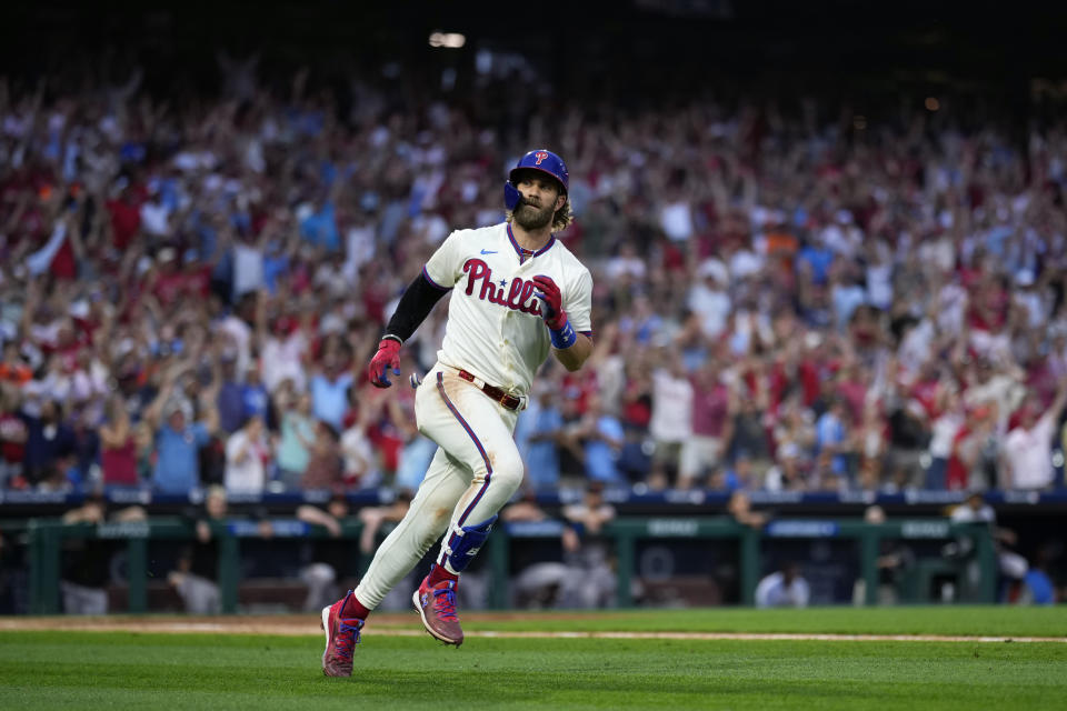 Philadelphia Phillies' Bryce Harper runs the bases after hitting a three-run home run against San Francisco Giants pitcher Camilo Doval during the ninth inning of a baseball game, Wednesday, Aug. 23, 2023, in Philadelphia. (AP Photo/Matt Slocum)