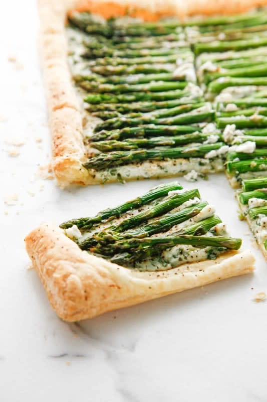 <p>The Brooklyn Cook</p><p>Frozen puff pastry helps this showstopper be ready in about 25 minutes.</p><p><strong>Get the recipe: <a href="https://www.thebrooklyncook.com/creamy-herbed-ricotta-and-asparagus-puff-pastry-tart/" rel="nofollow noopener" target="_blank" data-ylk="slk:Creamy Herbed Ricotta and Asparagus Puff Pastry Tart;elm:context_link;itc:0;sec:content-canvas" class="link ">Creamy Herbed Ricotta and Asparagus Puff Pastry Tart</a></strong></p><p><strong>Related: <a href="https://www.yahoo.com/lifestyle/60-star-asparagus-recipes-recipe-191939420.html" data-ylk="slk:60 All-Star Asparagus Recipes;elm:context_link;itc:0;sec:content-canvas;outcm:mb_qualified_link;_E:mb_qualified_link;ct:story;" class="link  yahoo-link">60 All-Star Asparagus Recipes</a></strong></p>