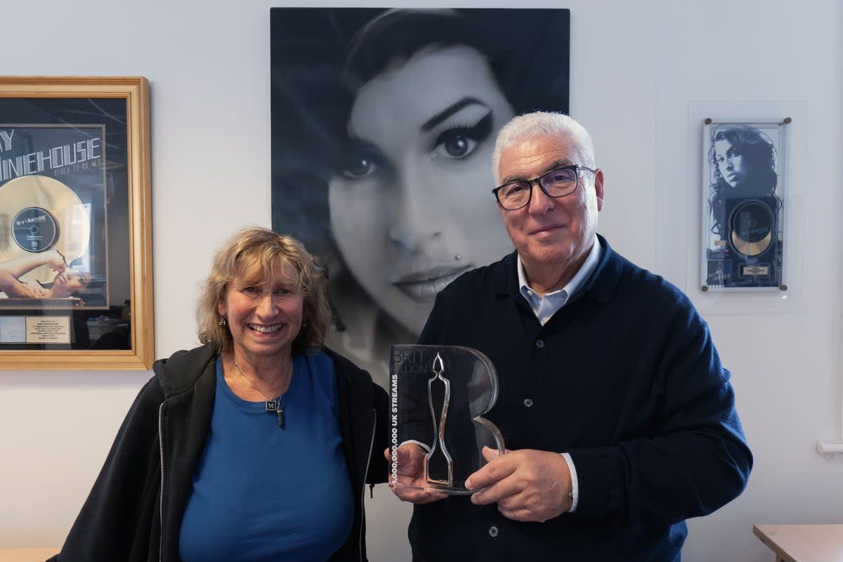 Mitch and Janis Winehouse collect the Brit Billion award for lifetime Amy Winehouse streams (BPI)