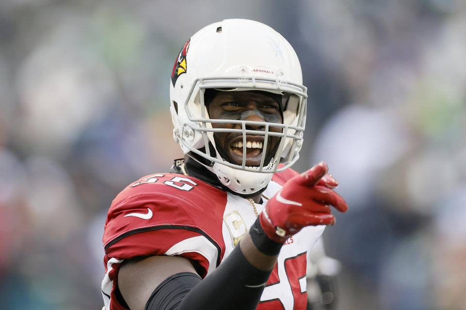 SEATTLE, WASHINGTON - NOVEMBER 21: Chandler Jones #55 of the Arizona Cardinals, headed to the Raiders, reacts after his tackle against the Seattle Seahawks during the second half at Lumen Field on November 21, 2021 in Seattle, Washington. (Photo by Steph Chambers/Getty Images)