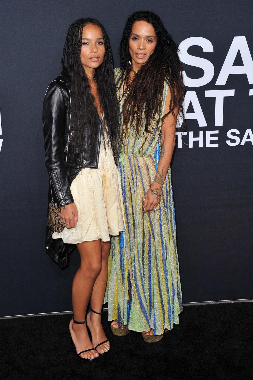 Zoë Kravitz and Lisa Bonet walk a red carpet together in February 2016.