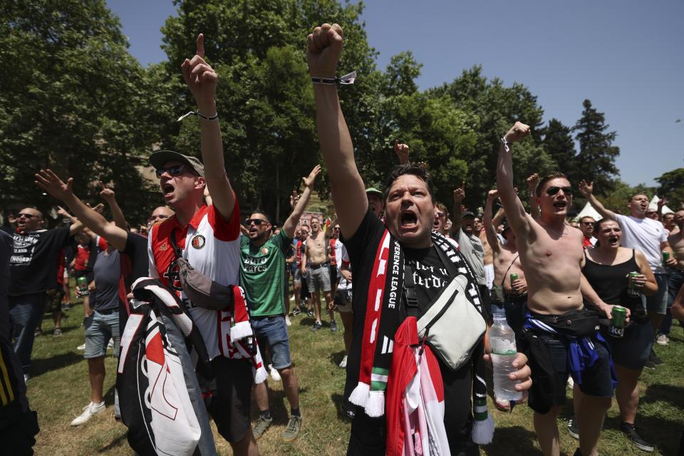 Feyenoord fans shout slogans ahead of the Europa Conference League final between Roma and Feyenoord in Tirana, Albania, Wednesday, May 25, 2022. (AP Photo/Franc Zhurda)