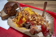 Vegan curry wursts are displayed at a "Best Worscht in Town" sausage stand in Frankfurt, Germany, Tuesday, Sept. 5, 2023. Of the 200,000 sausages Lars Obendorfer sells every year, 15% are plant-based. (AP Photo/Michael Probst)