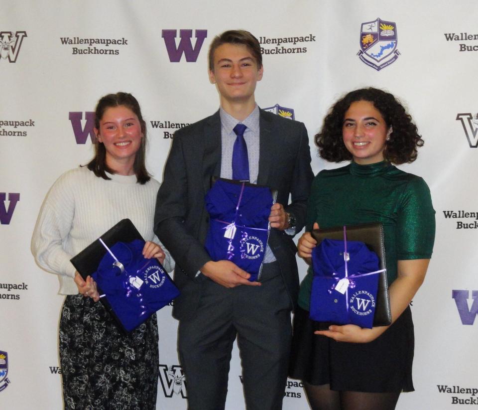 Wallenpaupack Area High School seniors were honored Dec.7 for exemplary academics and profitable application of extracurricular opportunities offered at the school. From left are Grace Peppiatt, who is planning on becoming a traveling physician assistant; Andrew Bromberger, whose sights are set on being an astronautical engineer; and Emily Kangal, whose goal is to achieve a doctorate and be an English professor.