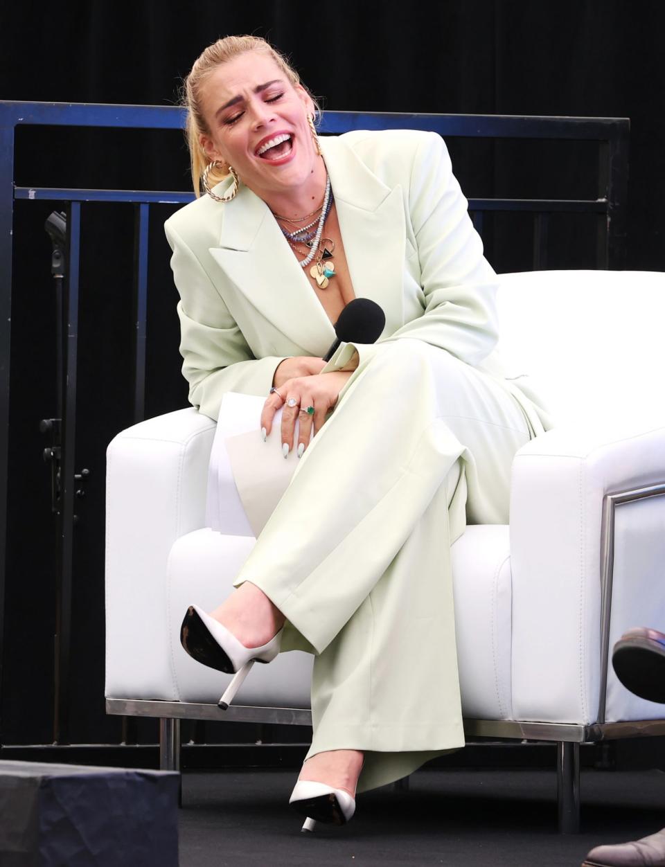 <p>Busy Philipps looks chic in an oversized pantsuit at the Tribeca Film Festival, where she and Tina Fey chat during a 'Tribeca Talks' session on June 11 at Spring Studios in N.Y.C. </p>