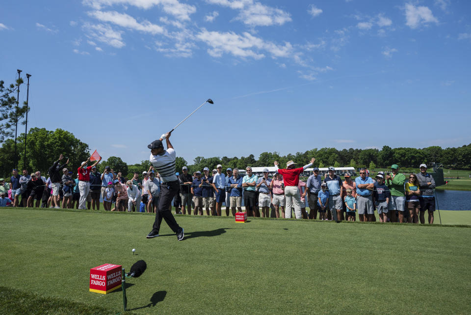 Bryson DeChambeau tees off on the 15th hole during the third round of the Wells Fargo Championship golf tournament at Quail Hollow, Saturday, May 8, 2021, in Charlotte, N.C. (AP Photo/Jacob Kupferman)