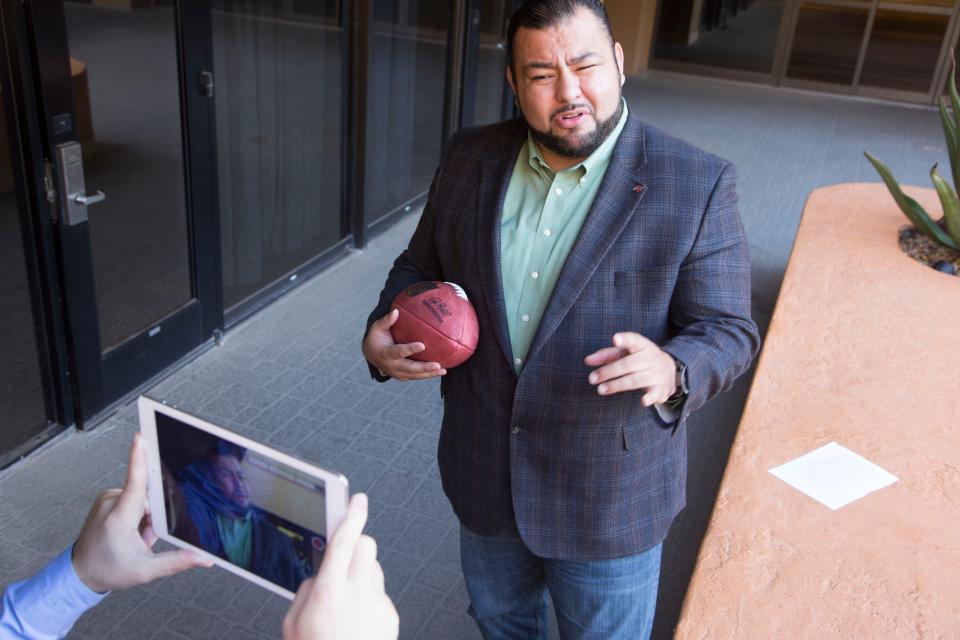 Former Arizona Cardinal offensive lineman    Rolando Cantu discusses the NFL Experience at the Hyatt Regency on Dec 9, 2014.