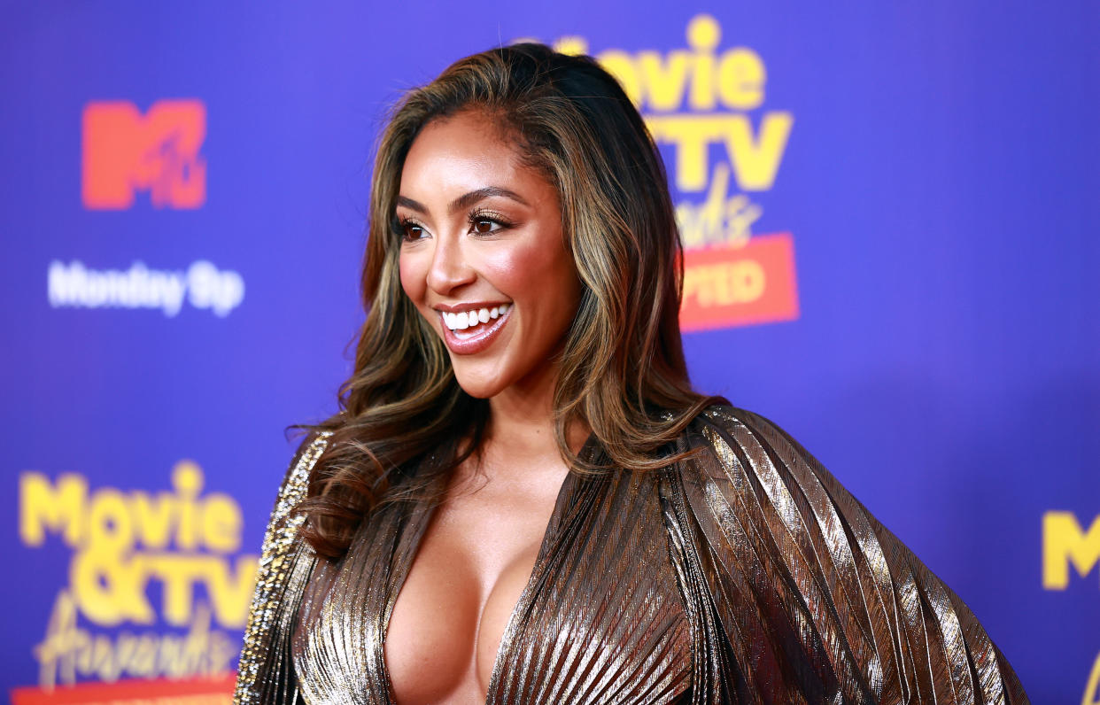 LOS ANGELES, CALIFORNIA - MAY 17: In this image released on May 17, Tayshia Adams attends the 2021 MTV Movie & TV Awards: UNSCRIPTED in Los Angeles, California. (Photo by Matt Winkelmeyer/2021 MTV Movie and TV Awards/Getty Images for MTV/ViacomCBS)