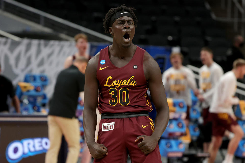 Loyola Chicago's Aher Uguak reacts after drawing a foul against Illinois during the second half of their game on March 21. (Stacy Revere/Getty Images)