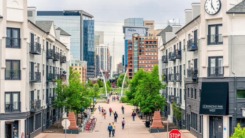 Denver, USA - People walking on a pedestrianized street in Denver's LoHi district, located near to the city centre.