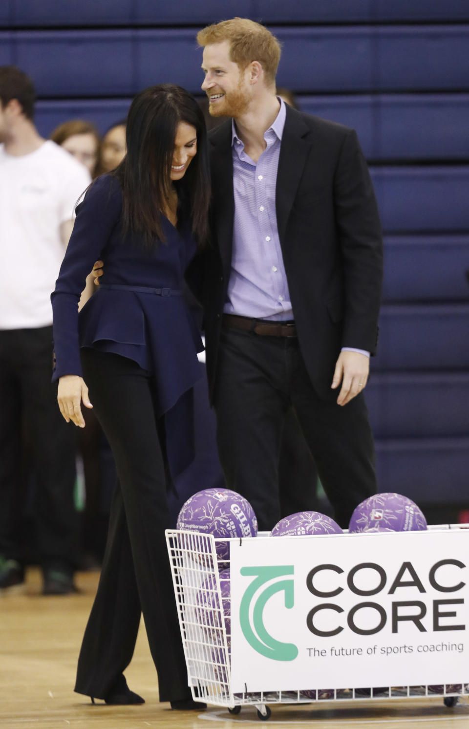 After a quick win by Meghan’s team, Harry congratulated his wife with a sweet embrace. Source: Getty