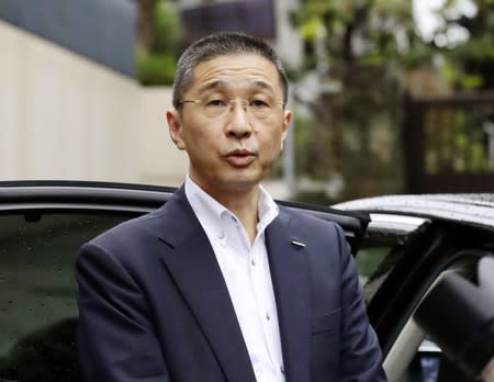 Nissan CEO Hiroto Saikawa speaks to media before the company's board members meeting in front of his residence in Tokyo