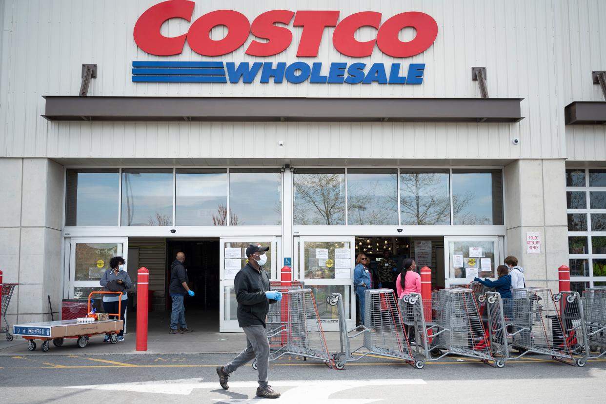People social distance themselves as they shop at Costco in Washington, DC, on April 5, 2020. - The number of confirmed coronavirus, COVID-19,  cases in the United States has topped 300,000 and there have been more than 8,100 deaths, Johns Hopkins University reported on Saturday. (Photo by JIM WATSON / AFP) (Photo by JIM WATSON/AFP via Getty Images)