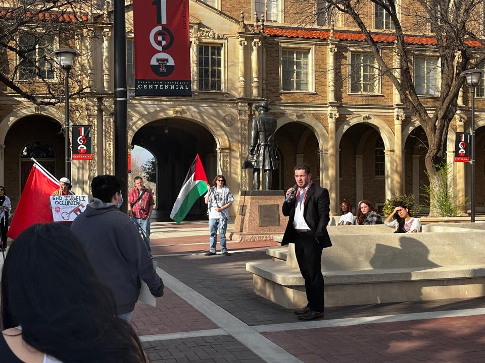 Ahmad Altabaa, a senior at Tech, speaking to students gathered in the courtyard near the Texas Tech Administration Building Thursday afternoon, March 7, to protest in support of Dr. Fúnez-Flores, who was suspended by the university earlier this month over Israel-Hamas war comments.