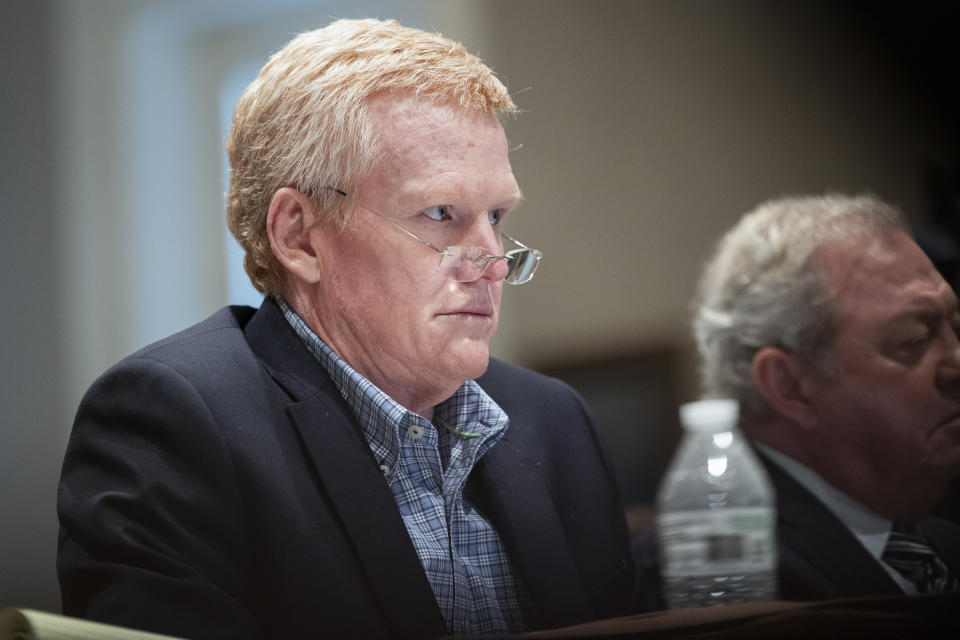 Alex Murdaugh listens to testimony about cellphones during his double murder trial at the Colleton County Courthouse on Friday, Feb. 10, 2023, in Walterboro, S.C. The 54-year-old attorney is standing trial on two counts of murder in the shootings of his wife and son at their Colleton County home and hunting lodge on June 7, 2021. (Joshua Boucher/The State via AP, Pool)