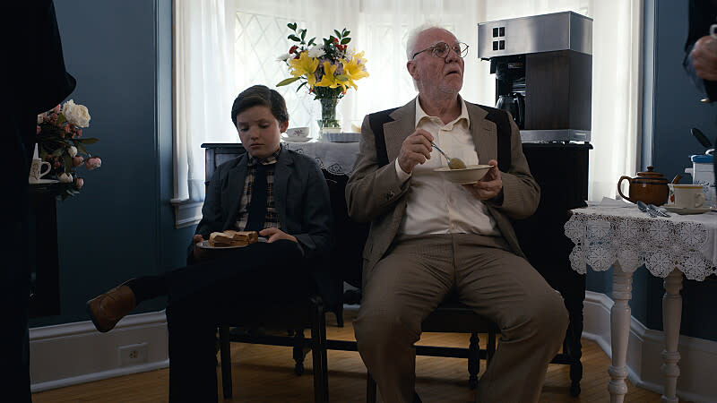  Benjamin Evan Ainsworth as Mark Critch and Malcolm McDowell as Patrick “Pop” Critch in Son of a Critch. 