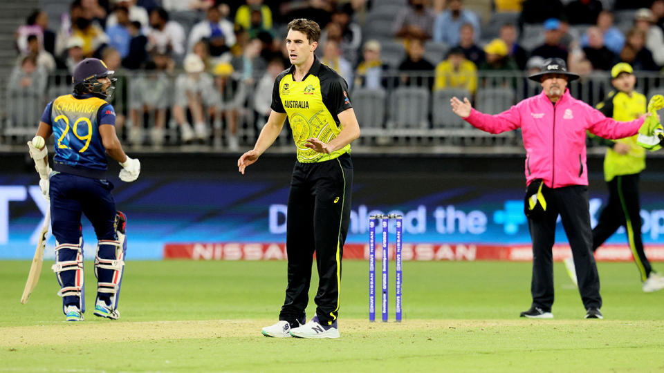 Pat Cummins reacts after a bowling a delivery at the T20 World Cup.