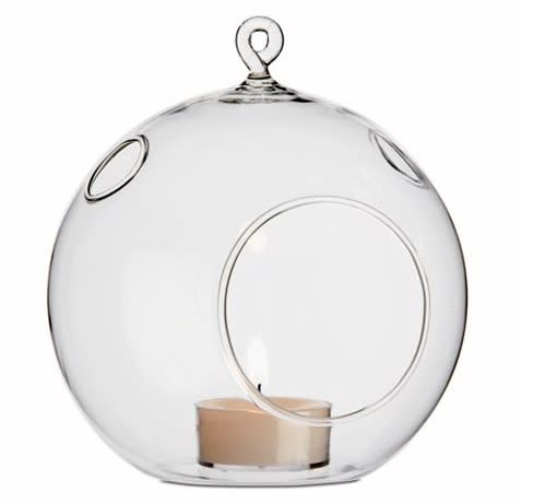 Delicate handblown glass orbs would shimmer beautifully in the evening.