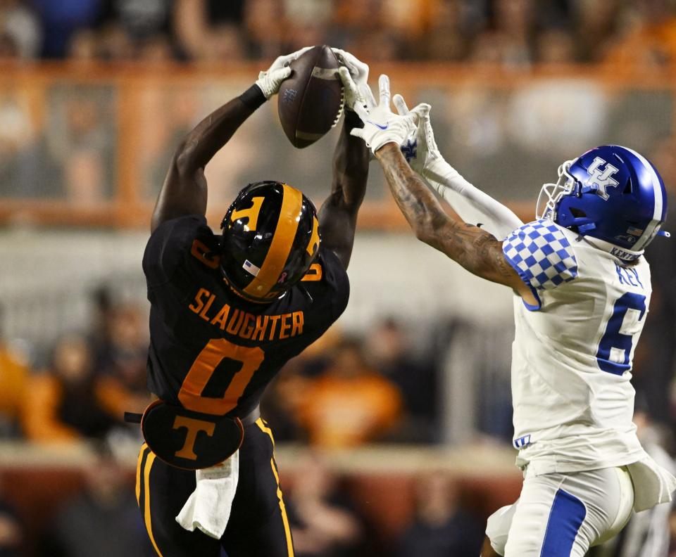 KNOXVILLE, TENNESSEE – OCTOBER 29: Doneiko Slaughter #0 of the Tennessee Volunteers intercepts a pass intended for Dane Key #6 of the Kentucky Wildcats in the third quarter of the game at Neyland Stadium on October 29, 2022 in Knoxville, Tennessee. (Photo by Eakin Howard/Getty Images)