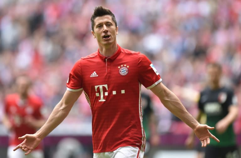 Bayern Munich's Robert Lewandowski celebrates after scoring a goal during their German first division Bundesliga match against Schalke 04, in Gelsenkirchen, on April 1, 2017