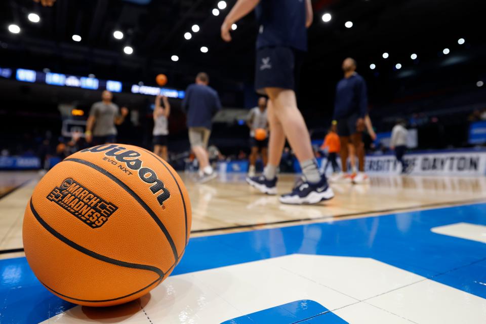 A basketball with the March Madness logo is photographed March 18 in Dayton during NCAA Tournament practice.